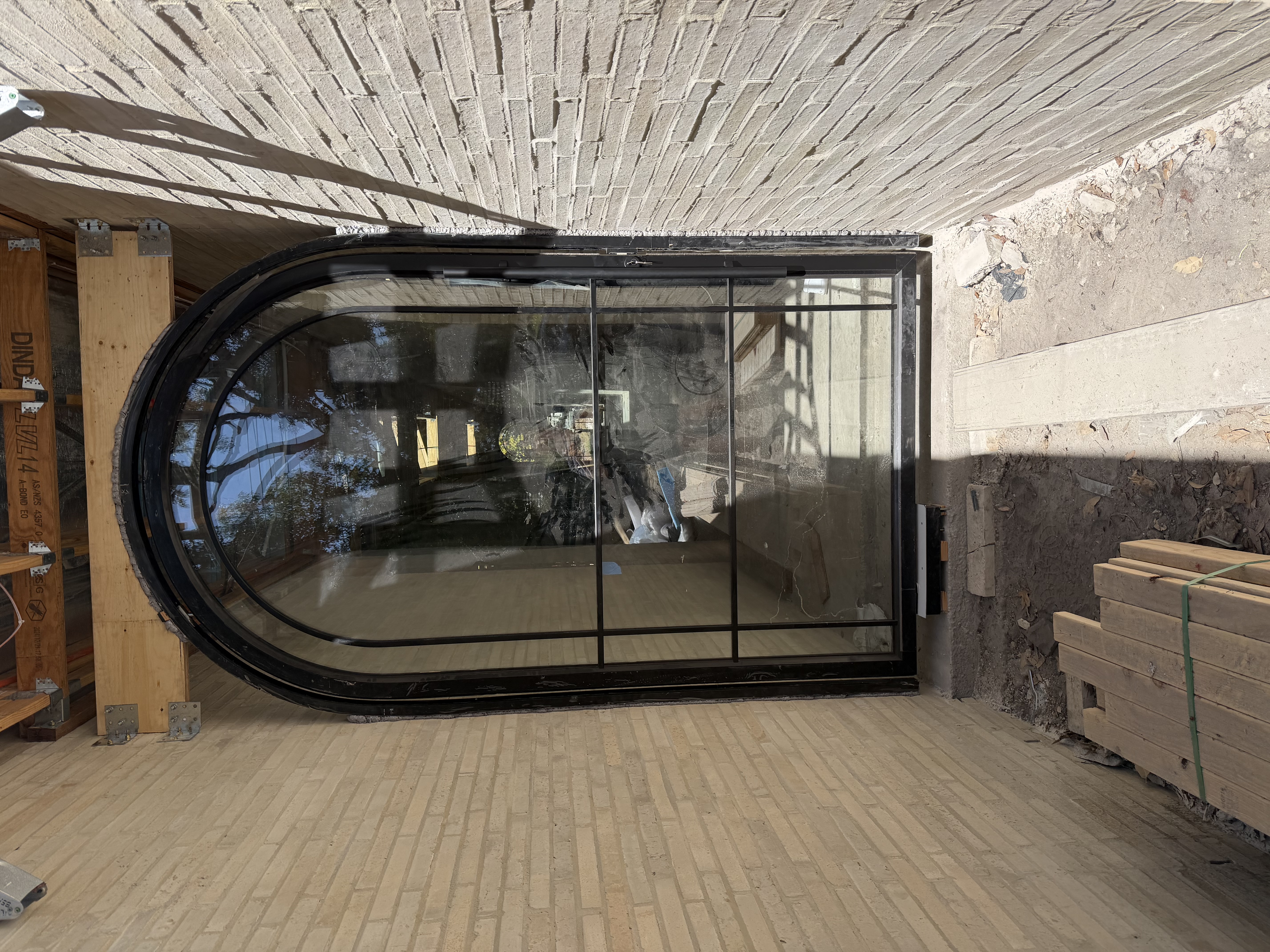 Curved capsule-shaped window unit ready for dispatch at Chinese factory